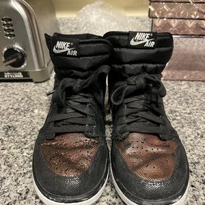 Woman’s Jordan 1 size 8.5 rose gold